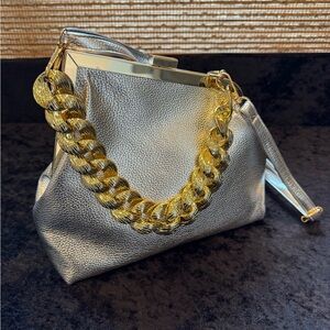 NEW - Metallic Silver Women’s Handbag w/acrylic chain to accent